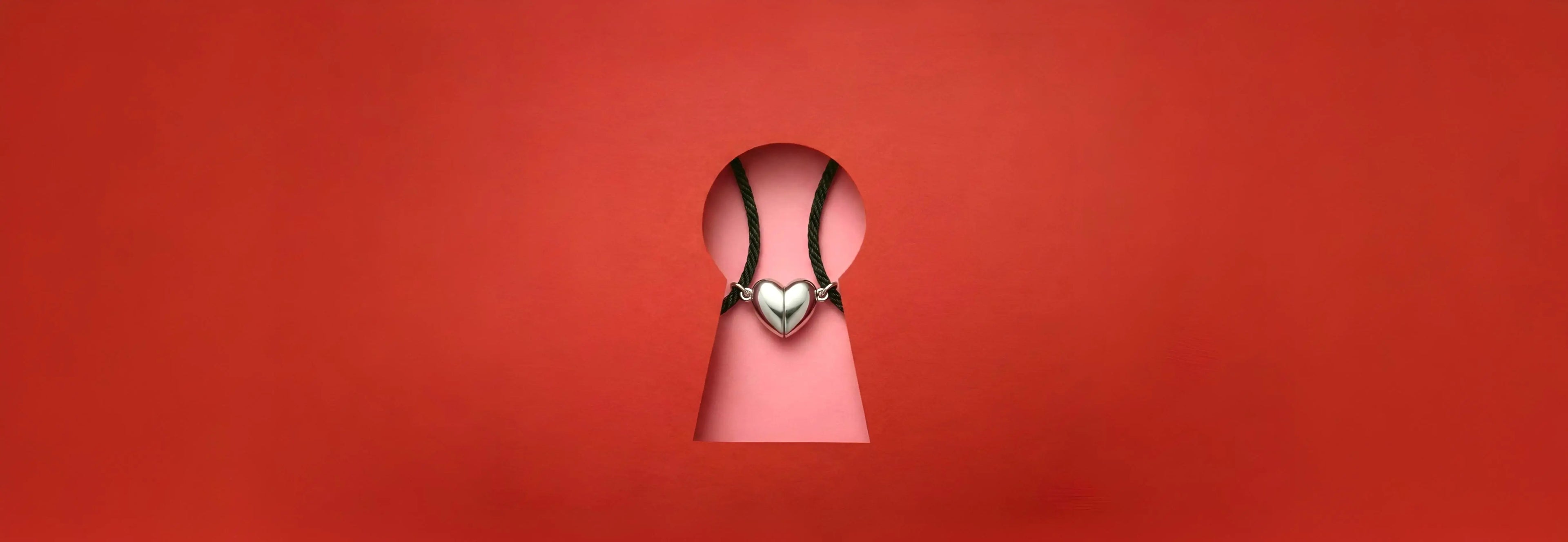 Heart-shaped object on a red background
