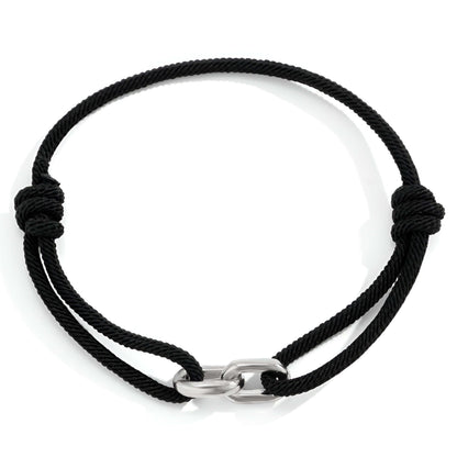 Black cord bracelet with a silver clasp on a white background